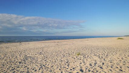 A beautiful, very wide beach on the Baltic Sea. Fine sand, sunny day. Gorgeous landscape. Slajszewo, Poland
