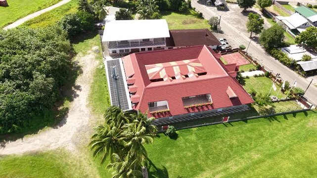 Huahine Island, French Polynesia. Drone Shot of School, Buildings and Port in Fare Village