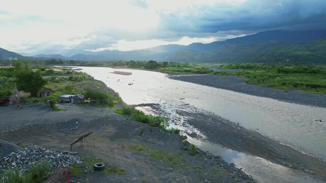A forward aerial captures the Chico River winding through Bontoc&rsquo;s valley with lush hills beyond Bontoc, Nueva Vizcaya, Philippines