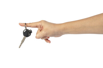 A black motorcycle key in a hand against a transparent background.