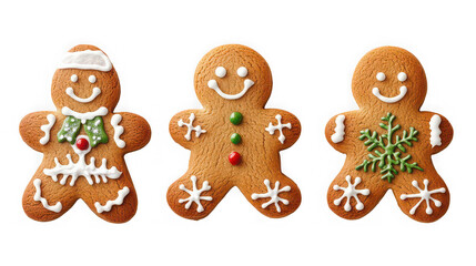 Fototapeta premium Three festive gingerbread men cookies decorated with white green and red icing for holidays