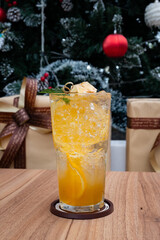 Festive Refreshment: A bright and bubbly beverage adorned with fresh garnishes, ready to quench your thirst and add a touch of cheer.