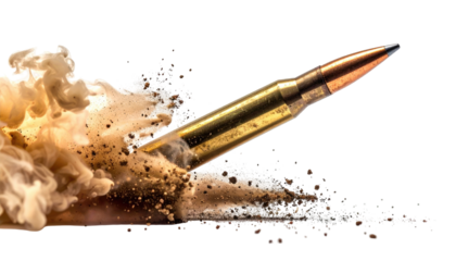 Projectile speeds by, engulfed in a burst of dust and impact, against a stark black background