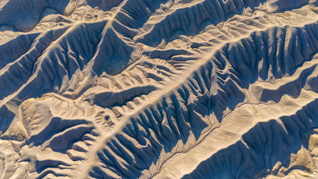 Lunar landscape. Drought and dry riverbeds. Aerial view of desert structures. Global warming and climate change. Universal use. General shots.