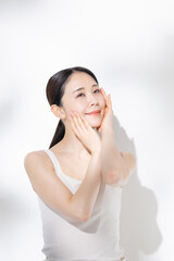 Fototapeta premium スキンケアをする女性