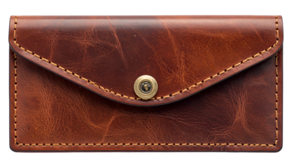 A close-up shot of a small, rectangular brown leather case, featuring a flap closure and visible stitching along the edges