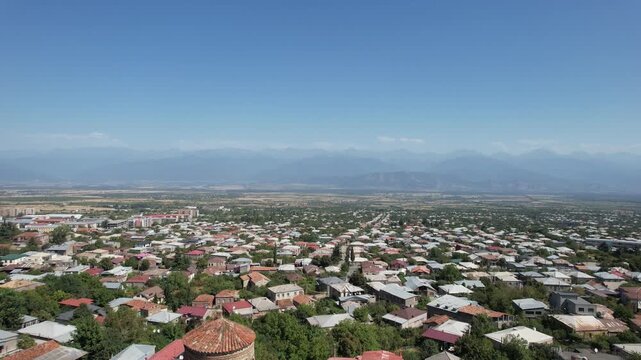 Aerial view of the historic Georgian town of Telavi overlooking the ancient Batonis Tsikhe fortified complex in the Kakheti region during spring