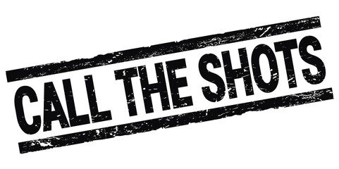 CALL THE SHOTS text on black rectangle stamp sign.
