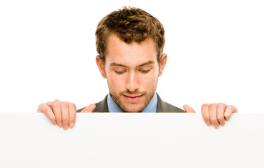 Business, man and poster for mockup in studio on white background for promotion. Advertising, marketing and sign board or placard for presentation with instructions, information and guidelines