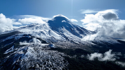 Obraz premium Osorno Volcano In Osorno Los Lagos Chile. Breathtaking Of Iconic Snow Capped Volcano Landscape. Nature Travel Destination Snow Covered Forest Trees. Snow Covered Patagonia Aerial View Floresta.