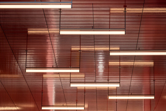 Urban architecture interior with modern lighting and ceiling geometry, abstract pattern design and minimalism shaping contemporary architectural space