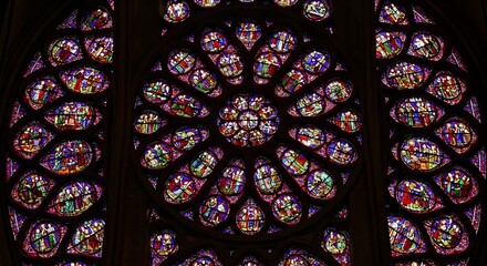 Detailed View of Large Symmetrical Stained Glass Rose Window in a Gothic Cathedral