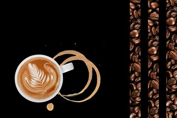 Top view of a coffee cup with latte art spelling 'Coffee', surrounded by stains and beans on a black background, representing coffee culture