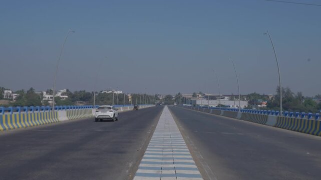 Diu, Gujarat, INDIA- 29th January 2025- Centre framed shot  showing Dr Shamji Bridge.Vehicles are moving from both sides.