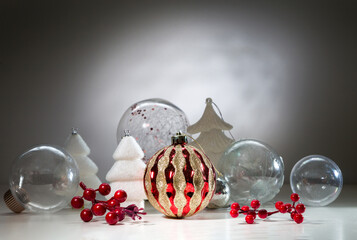 Christmas card with Christmas decorations and transparent balls. With space for text