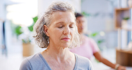 Yoga class, mature woman and meditation for mindfulness, fitness or breathing exercise for peace....