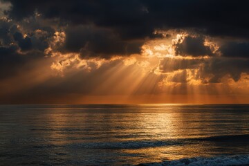 Obraz premium Dramatic Seascape at Golden Hour: Warm Horizon Light Through Stormy Sky