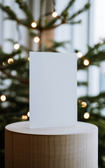 Mockup of white empty clean vertical greeting card for Christmas and New Year.
