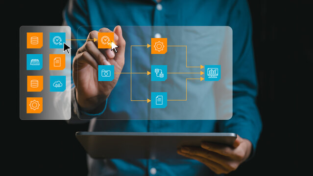 Low Code No Code Development and Drag and Drop Interface for Business Automation, Businessman use digital tablet to build custom software, rapid application prototyping, and automated business logic - Powered by Adobe