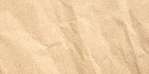 Abstract crumpled and creased recycle brown paper texture background