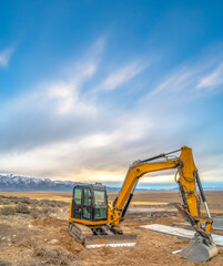 Excavator in the center of shot on a construction
