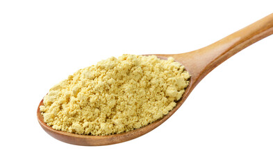 Ground mustard in a wooden spoon on a white background. Isolated