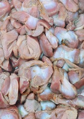 Close-Up of Fresh Raw Chicken Gizzards or Offal Ready for Asian Culinary Preparation