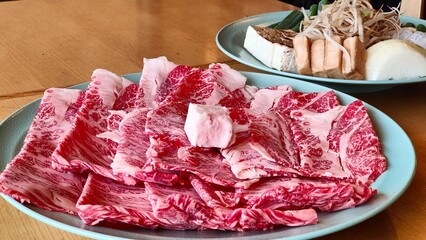 Thinly Sliced Premium Wagyu Beef with Intense Marbling for Sukiyaki or Shabu-shabu