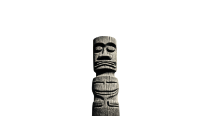 An ancient tribal wooden totem pole sculpture featuring traditional carved faces and masks isolated on a white background as a cultural native monument of history and art