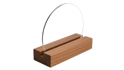 Isolated wooden display stand with clear acrylic arc for showcasing items on table