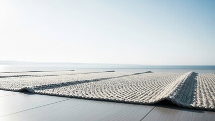 Serene ocean view with woven mat on wooden deck
