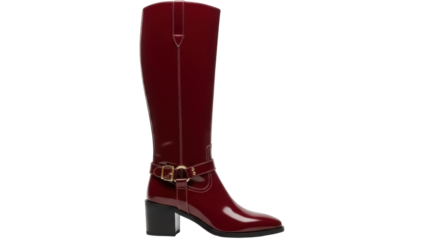 Isolated shiny leather knee high boot with decorative strap for fashion advertising ads