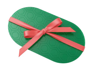 Isolated green oval shaped gift with a red ribbon and bow for special occasions or holidays