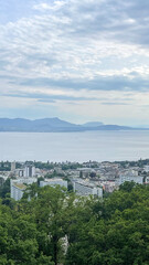 Scenic Lake and Mountain Landscape with a Charming Lakeside Village