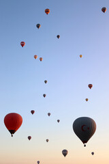 Naklejka premium Hot air balloons flying through the sky