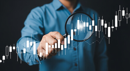 Man examining stock market data with magnifying glass for investment decisions