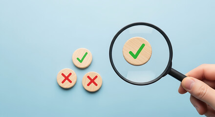 Hand holding magnifying glass over wooden circle with green check on blue background