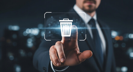 Businessman deleting data by touching futuristic trash bin icon on digital interface