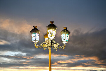 Lamppost decorated with colored glass	