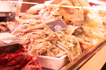 Raw meat, lamb tripe and cow tripe, on display at butcher shop