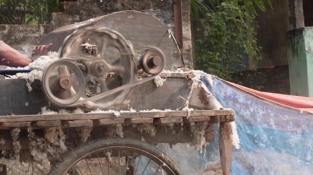 Vintage Cotton Gin Machine in Action