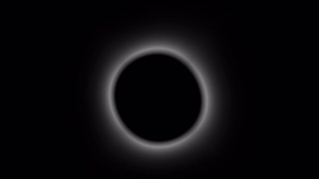 Celestial Spectacle: Witness the awe-inspiring total solar eclipse, where the moon completely obscures the sun, revealing a breathtaking corona around the obscured solar disc.