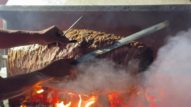 Doner Kebab Traditional Turkish Food Cag Kebabi. Rolling lamb meat doner kebab