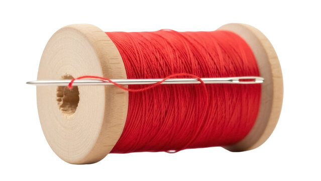 Red thread on wooden spool with needle isolated PNG, sewing material for crafts and textile projects, on transparent background