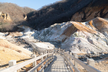 Jigokudani or Hell Valley in the town of Noboribetsu Onsen which displays hot steam vents,...