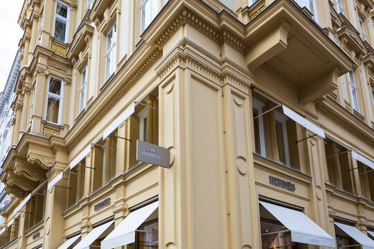 Vienna, Austria, October 17, 2025 - Signs on the corner of the flagship Herm&egrave;s store located at 22 Graben street in historical building