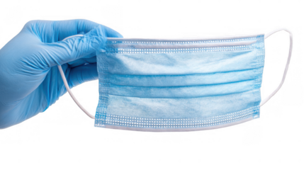 Hand wearing a blue medical glove holding a surgical mask against a transparent background, emphasizing health safety and infection control in healthcare settings