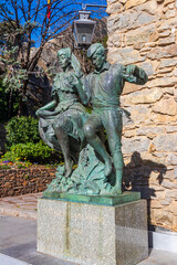 Obraz premium Statue of a dancing couple in front of the Casa de la Vall in Andorra la Vella, Andorra