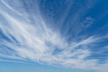 WIspy clouds and blue sky suitable for background or sky replacement