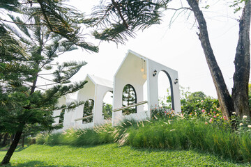 Modern Minimalist White Gable Houses on Green Hillside Garden